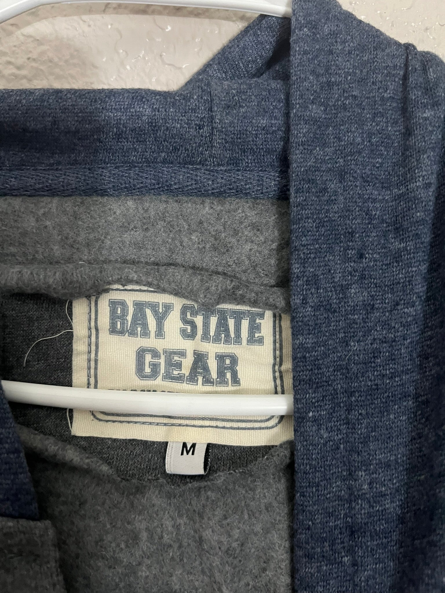 Boston Hoodie by Bay State Gear. Gray with blue sleeves and hood. Size M